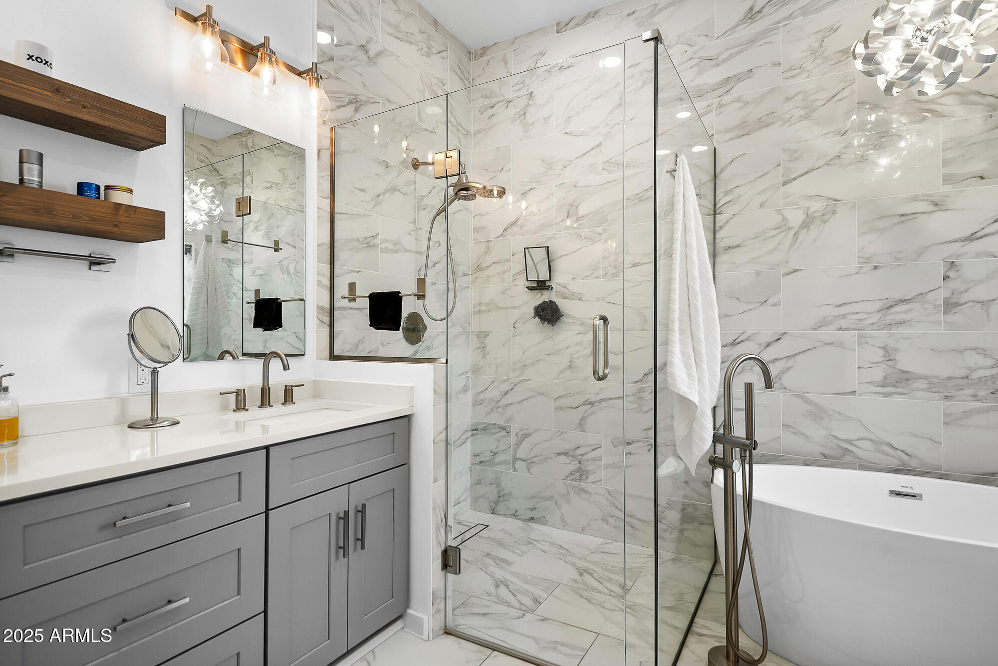 4526 East Heatherbrae Drive Phoenix, AZ 85018 - Photo 24 of 34 a bathroom with a double vanity sink mirror and shower