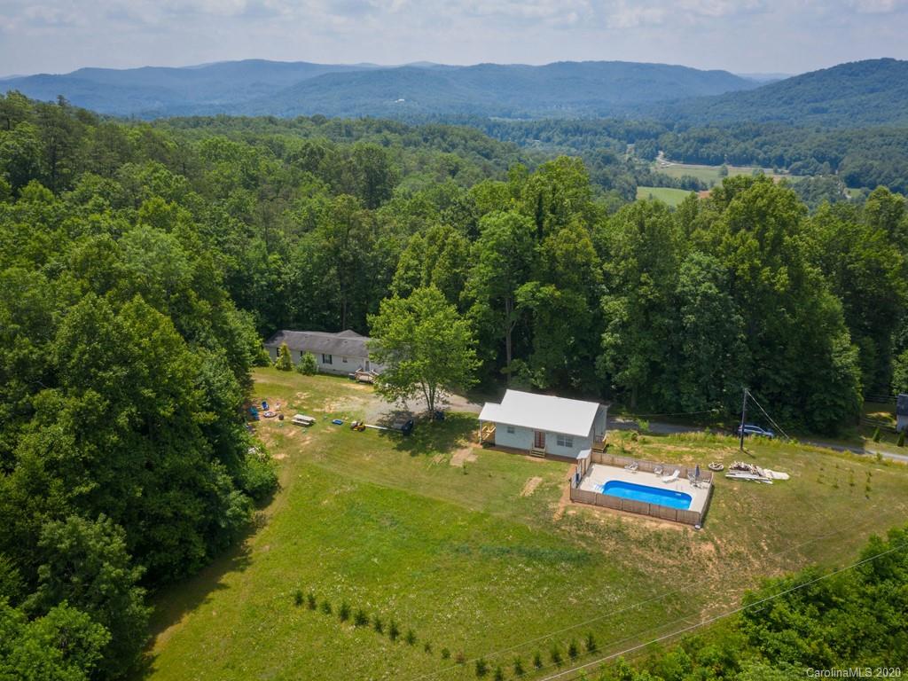 249 Bane Road Mills River, NC 28759 - Photo 1 of 30 a view of a mountain with a yard