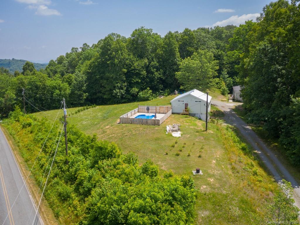 249 Bane Road Mills River, NC 28759 - Photo 2 of 30 a view of a backyard with swimming pool