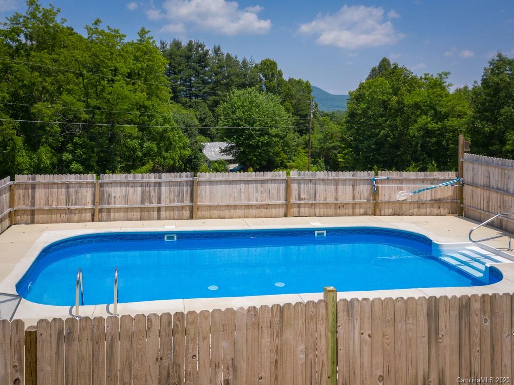 249 Bane Road Mills River, NC 28759 - Photo 11 of 30 a view of swimming pool with a yard