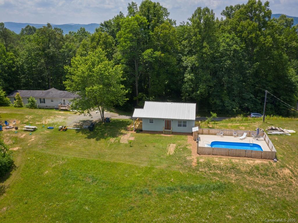 249 Bane Road Mills River, NC 28759 - Photo 5 of 30 an aerial view of a house with swimming pool and big yard