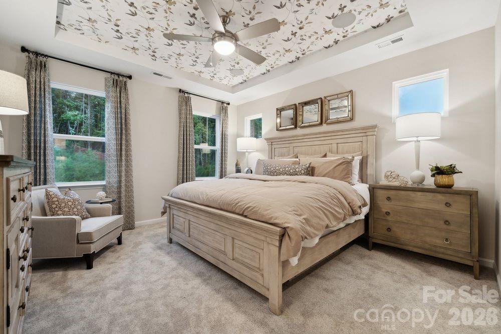 8671 Miles Gap Road Indian Land, SC 29707 - Photo 2 of 31 a bed room with a bed and a couch