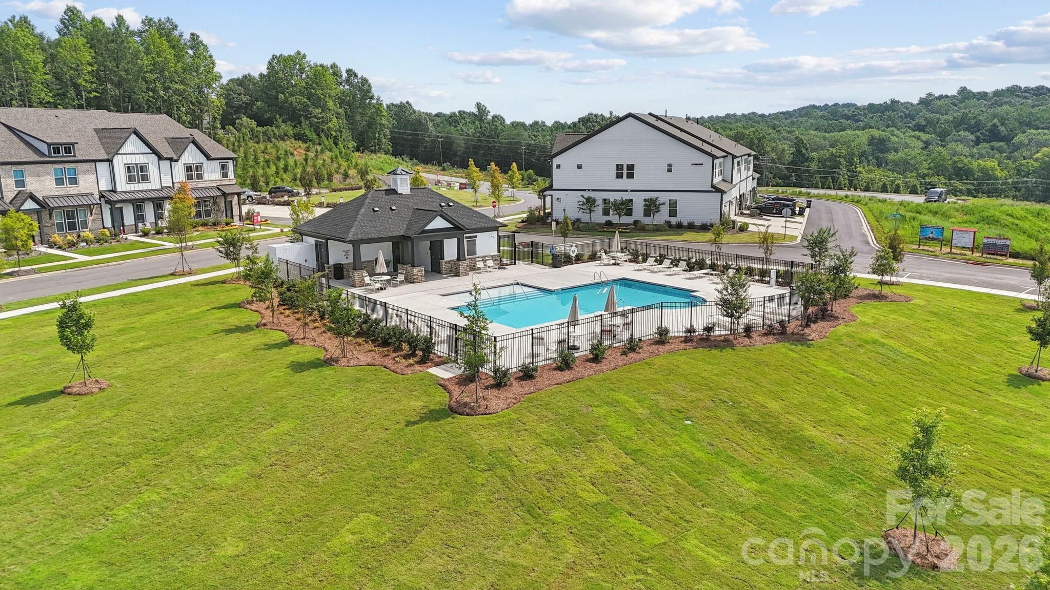 8671 Miles Gap Road Indian Land, SC 29707 - Photo 21 of 31 an aerial view of a house with a big yard and large trees