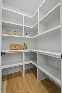 a view of an empty walk in closet