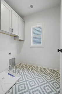 a view of a kitchen with a sink