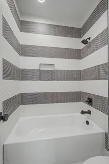 a bathroom with a bathtub