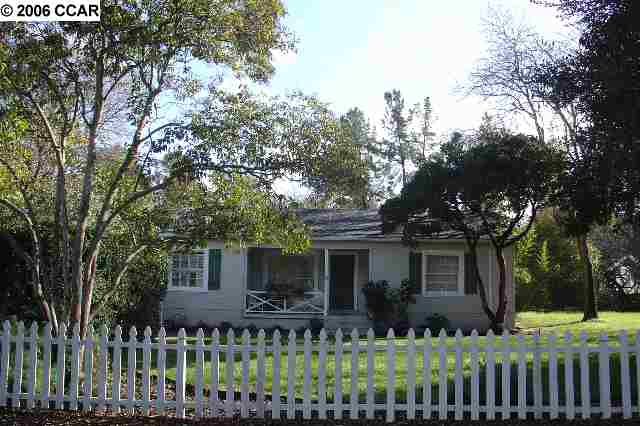 1571 Ridgewood Road Alamo, CA 94507 - Photo 1 of 1 a front view of house with yard and green space