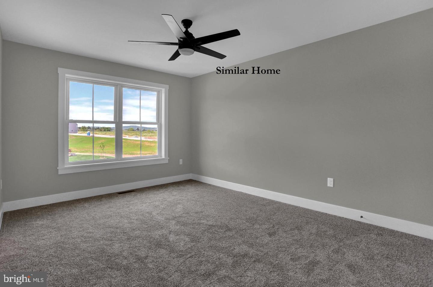 Hill Road, Unit CAMDEN New Freedom, PA 17349 - Photo 41 of 52 an empty room with a window and a fan