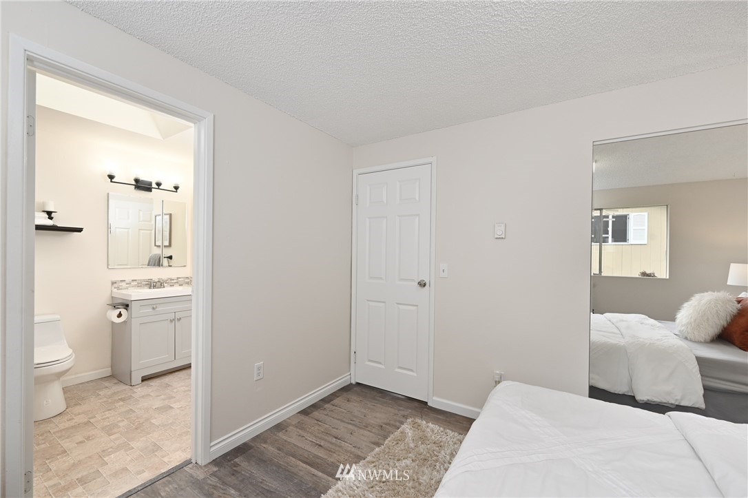 9211 3rd Place Southeast Everett, WA 98208 - Photo 23 of 33 a bedroom with a bed and view of bathroom