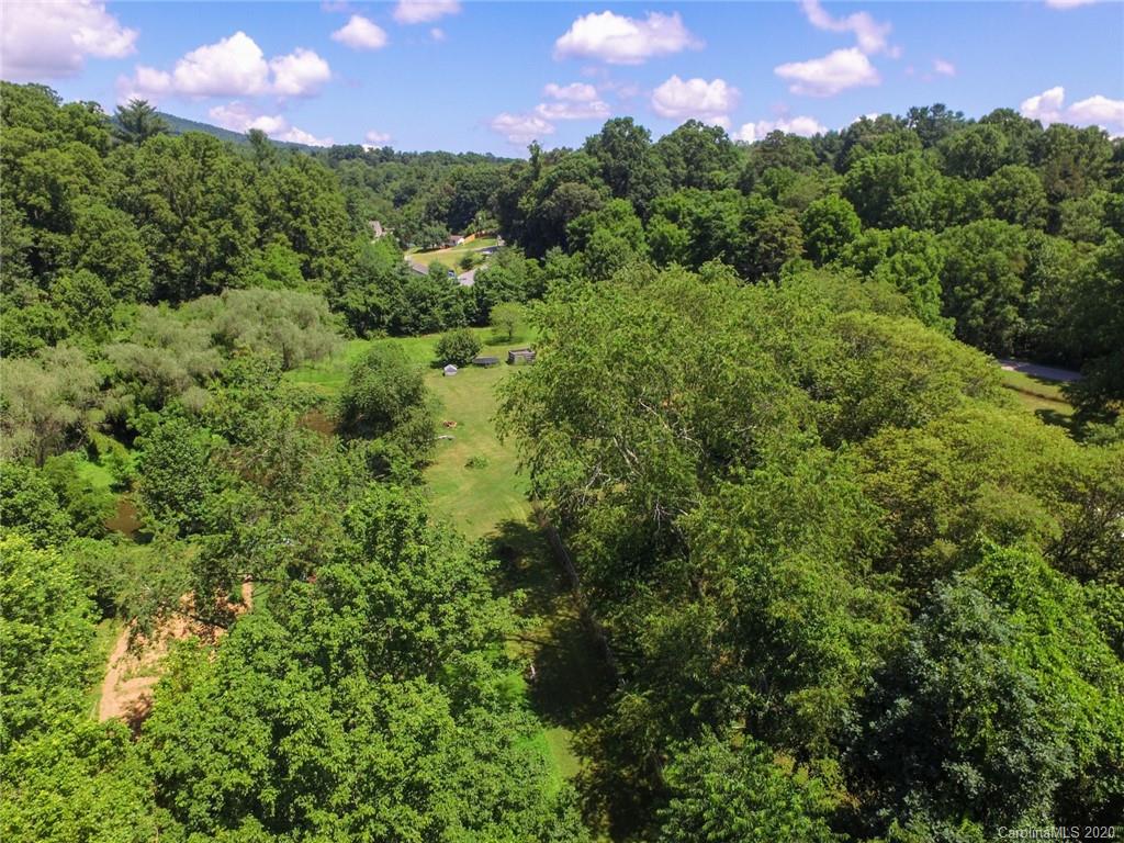 44 Lakeside Drive Asheville, NC 28806 - Photo 16 of 16 an aerial view of a houses with a yard and lake view