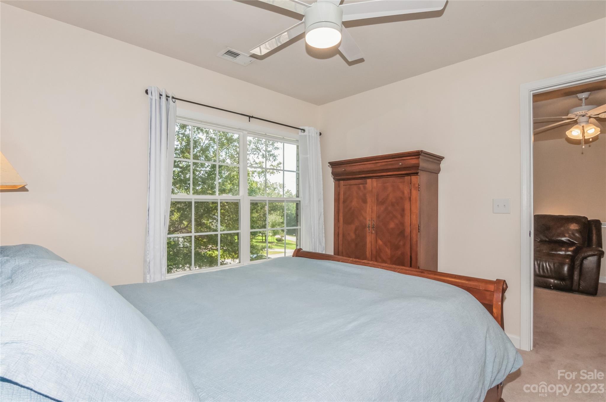 4227 Flint Drive Lancaster, SC 29720 - Photo 27 of 39 a bedroom with a large bed and a window