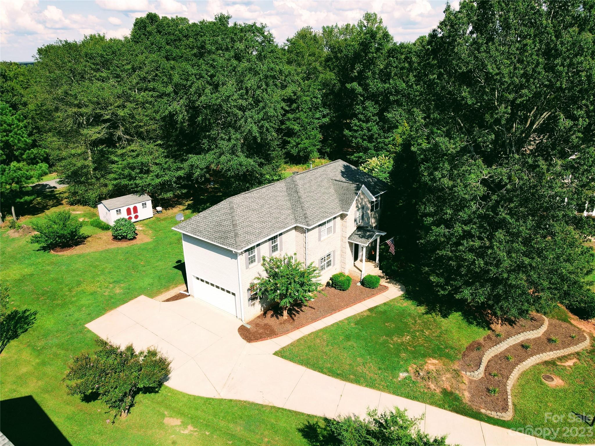 4227 Flint Drive Lancaster, SC 29720 - Photo 39 of 39 a view of a garden with a patio