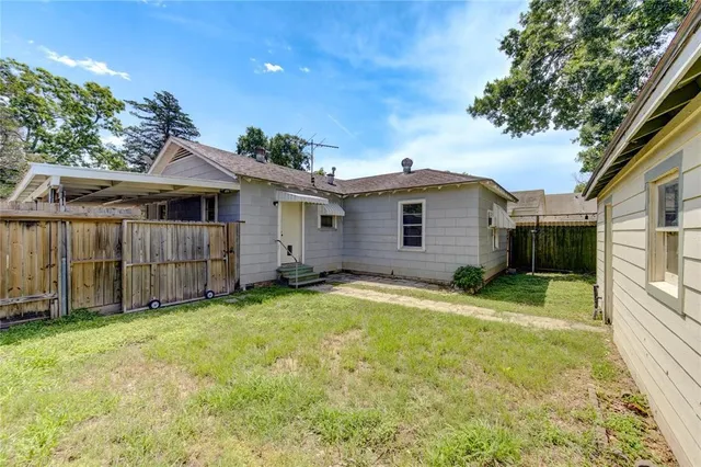 a house view with a garden space