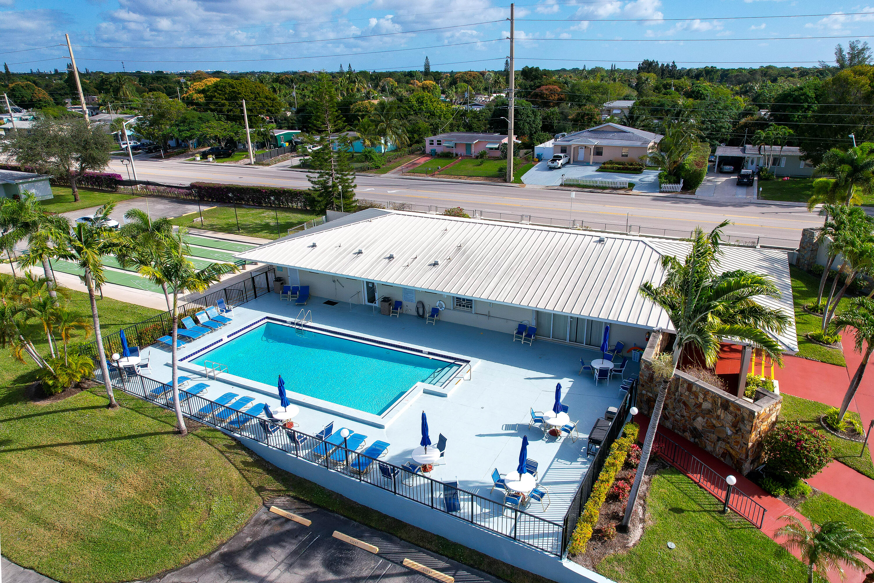 3331 Valley Road, Unit C Boynton Beach, FL 33435 - Photo 27 of 28 an outdoor space with seating area and swimming pool