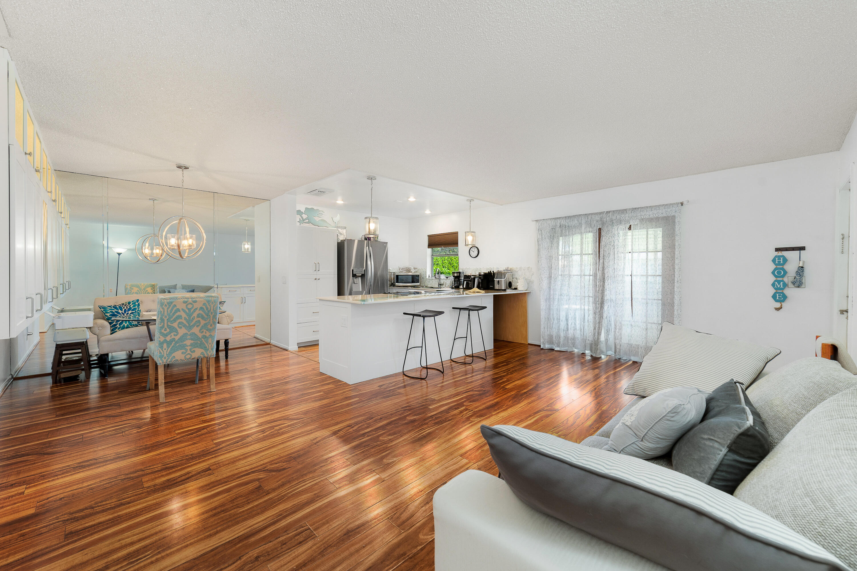 3331 Valley Road, Unit C Boynton Beach, FL 33435 - Photo 5 of 28 a living room with furniture and a wooden floor