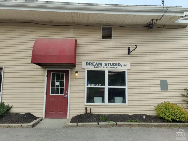 a front view of a house with a garage