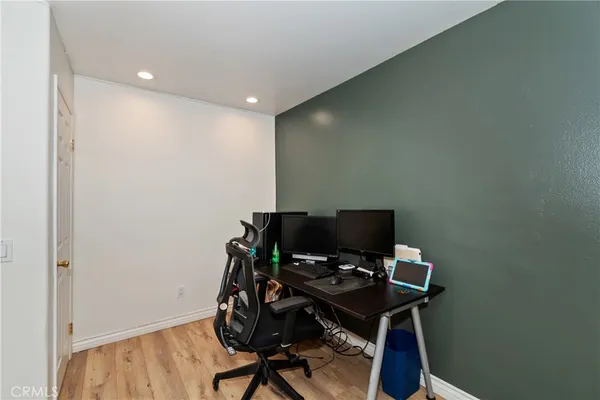 a view of a workspace with furniture