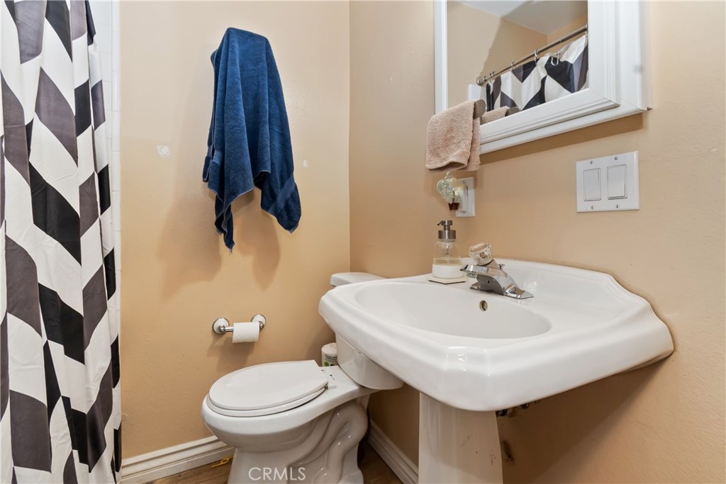 198 Pine Ridge Road Crestline, CA 92325 - Photo 20 of 45 a bathroom with a sink and a toilet