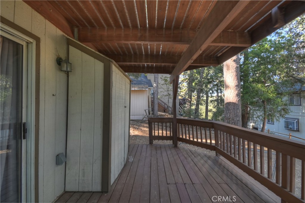 198 Pine Ridge Road Crestline, CA 92325 - Photo 25 of 45 a view of a balcony with wooden floor