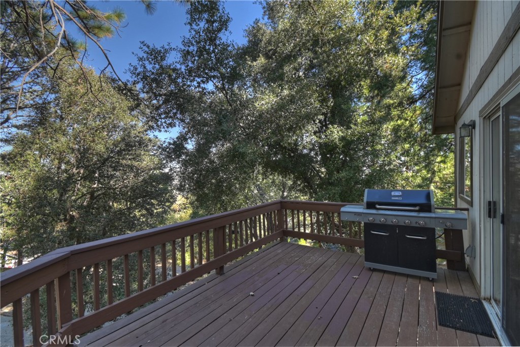 198 Pine Ridge Road Crestline, CA 92325 - Photo 33 of 45 a view of a balcony with wooden floor