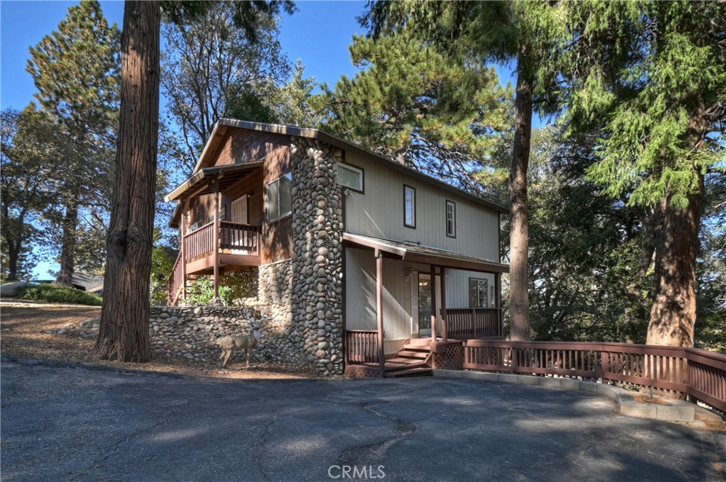 198 Pine Ridge Road Crestline, CA 92325 - Photo 37 of 45 a view of a house with a tree