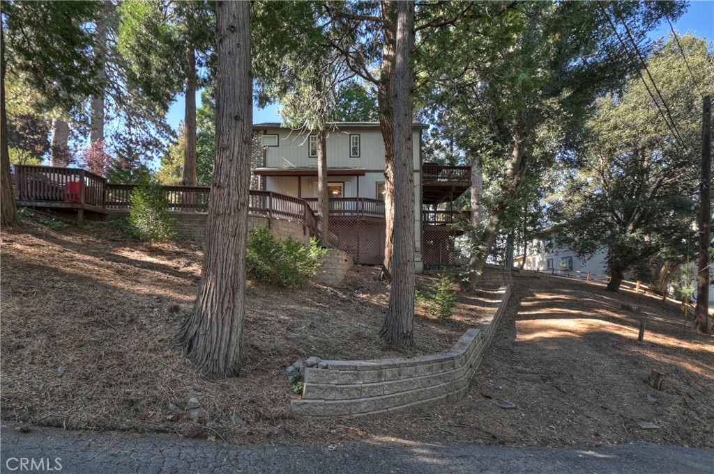 198 Pine Ridge Road Crestline, CA 92325 - Photo 42 of 45 a backyard of a house with lots of green space