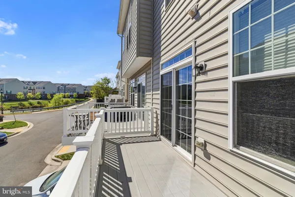 a view of balcony with furniture