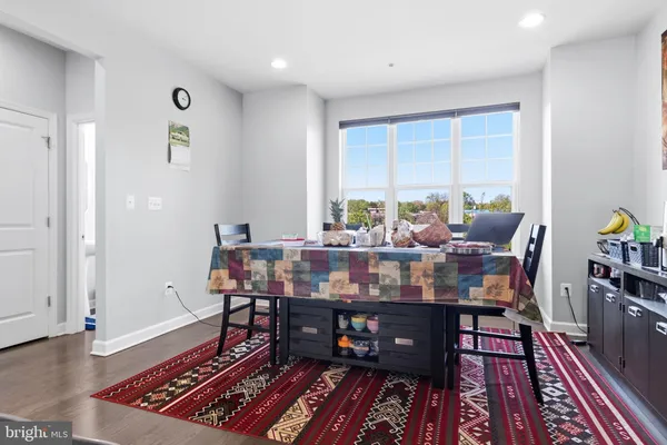 a room with furniture and wooden floor