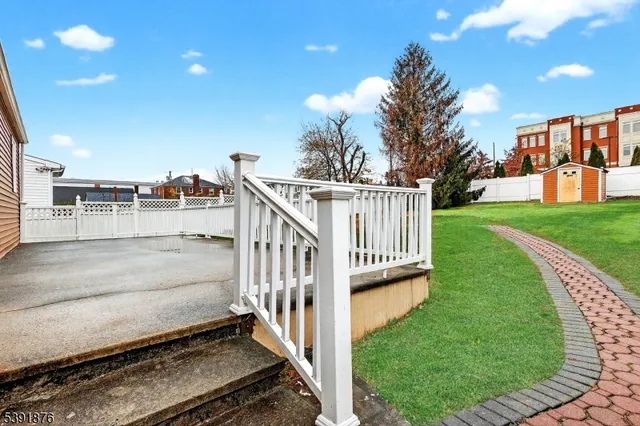 a view of a porch in front of house