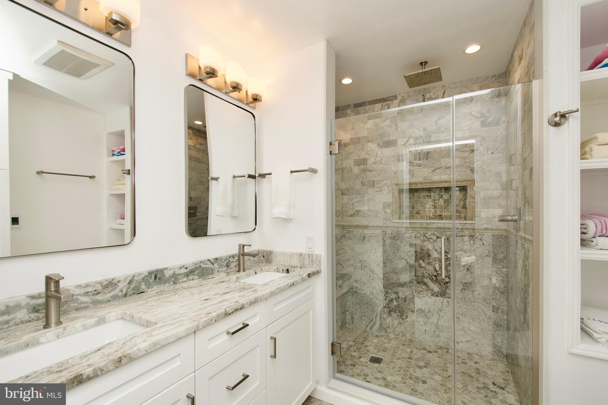 8005 Strauff Road, Unit 17 Towson, MD 21204 - Photo 40 of 49 a bathroom with a granite countertop sink mirror and double