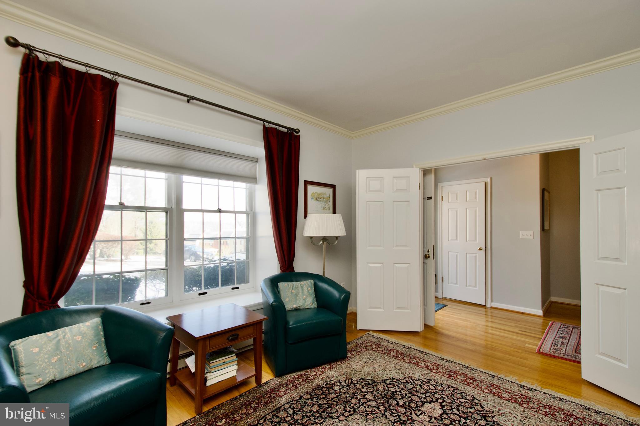 8005 Strauff Road, Unit 17 Towson, MD 21204 - Photo 4 of 49 a living room with furniture and a window