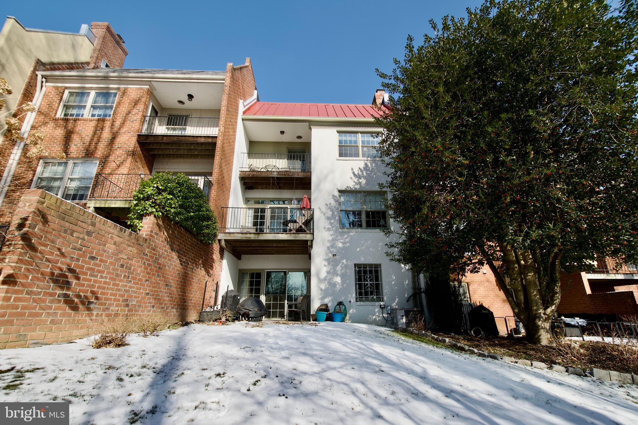 8005 Strauff Road, Unit 17 Towson, MD 21204 - Photo 47 of 49 a view of a building with a outdoor space