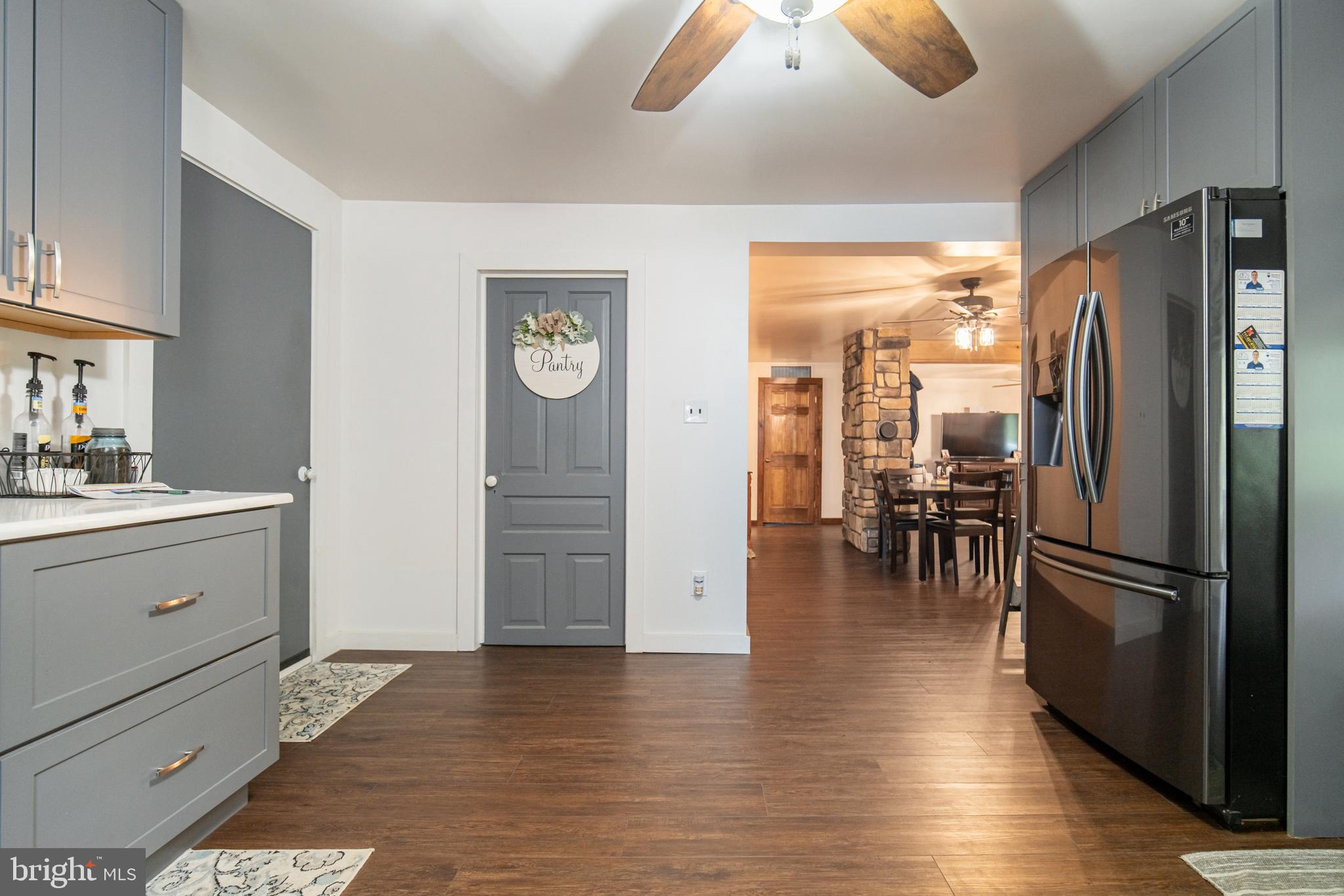 13127 Manor Furnace Road Brogue, PA 17309 - Photo 27 of 78 a kitchen with a refrigerator and white cabinets