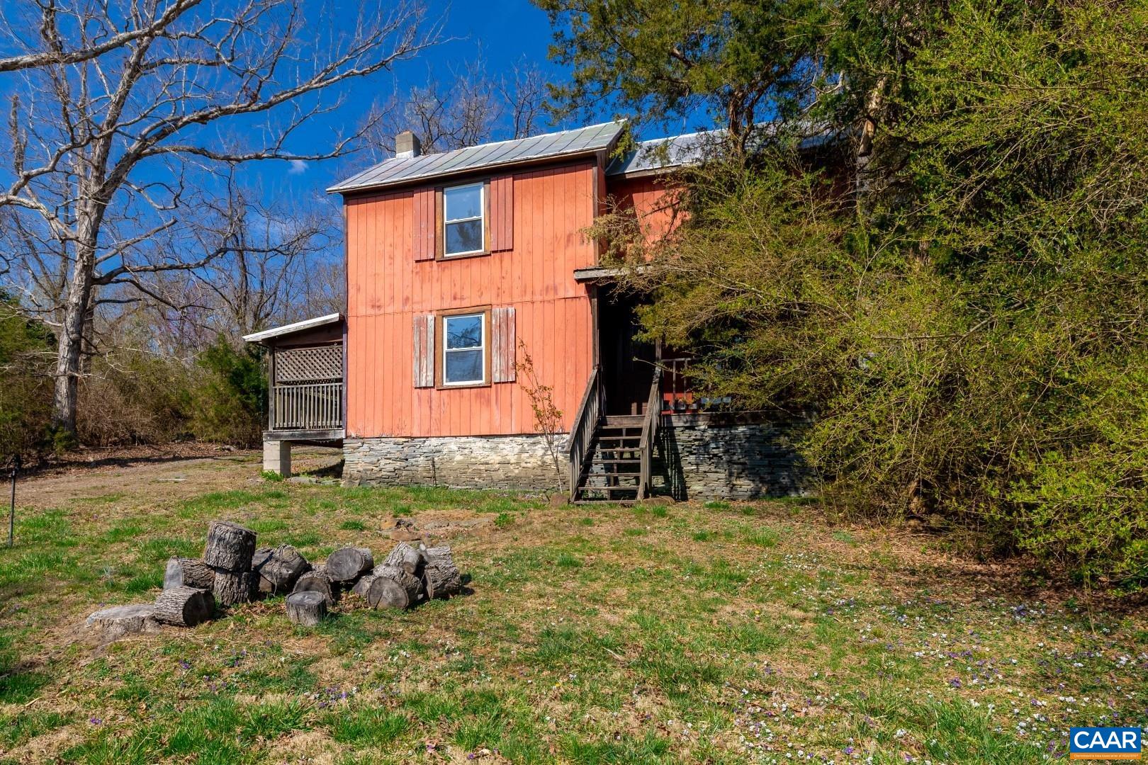 2143 Salem Road Schuyler, VA 22969 - Photo 11 of 36 a backyard of a house with lots of green space