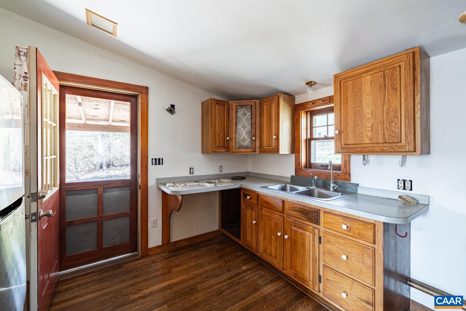 2143 Salem Road Schuyler, VA 22969 - Photo 14 of 36 a kitchen with stainless steel appliances granite countertop a sink stove and refrigerator