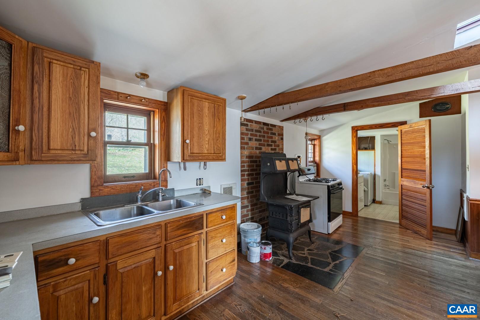 2143 Salem Road Schuyler, VA 22969 - Photo 15 of 36 a kitchen with sink refrigerator and cabinets