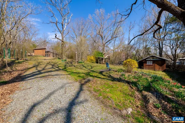 a view of a yard with some trees