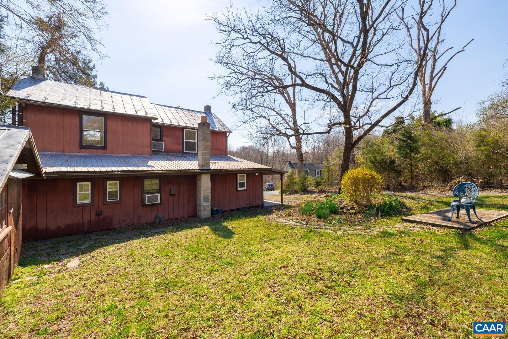 2143 Salem Road Schuyler, VA 22969 - Photo 10 of 36 a view of a house with a yard covered with snow in front of house