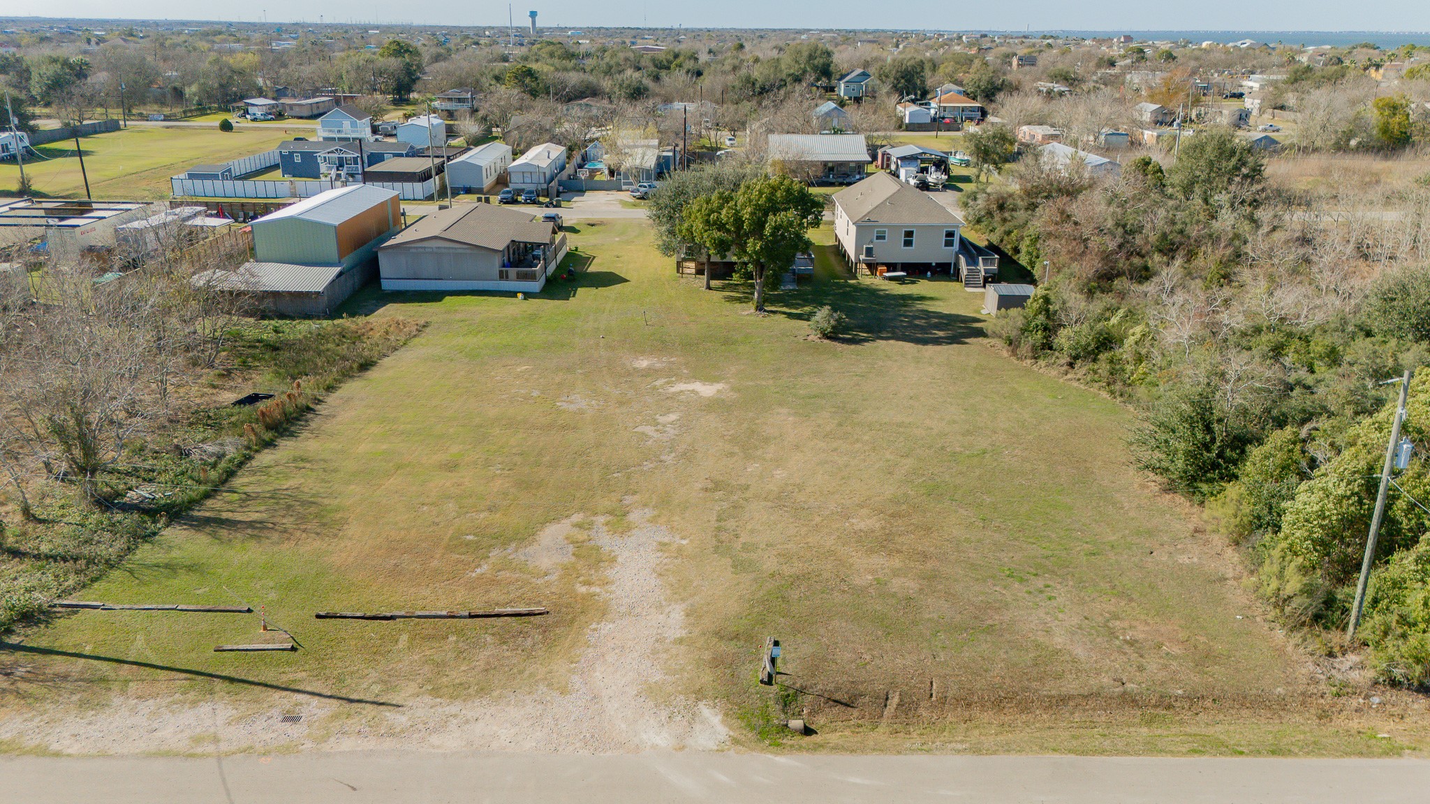 Na 5th Street San Leon, TX 77539 - Photo 6 of 8 an aerial view of a house with a yard