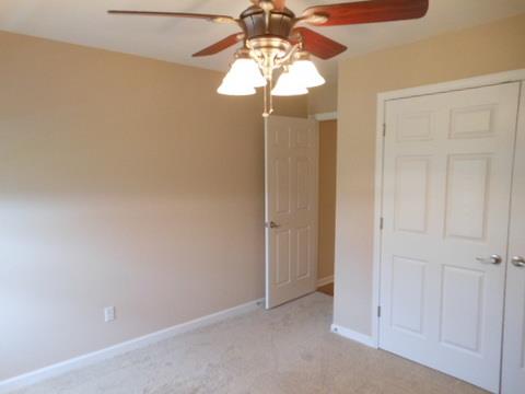 205 Lawrence Lane Springfield, TN 37172 - Photo 18 of 19 a view of a chandelier fan and closet