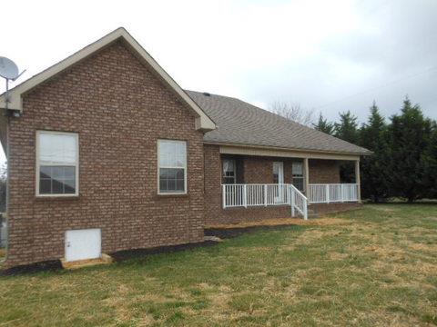 205 Lawrence Lane Springfield, TN 37172 - Photo 2 of 19 a front view of a house with garden