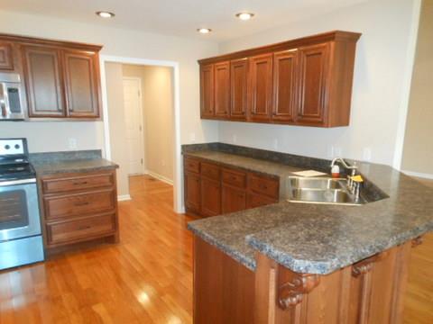 205 Lawrence Lane Springfield, TN 37172 - Photo 8 of 19 a kitchen with kitchen island granite countertop a sink and a stove