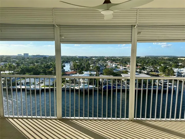 a view of a balcony with lake