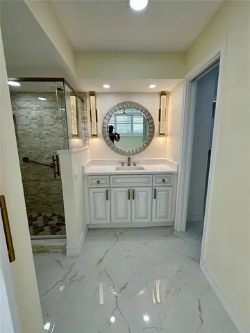 a bathroom with a toilet and shower