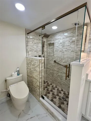 a bathroom with a shower and a bathtub
