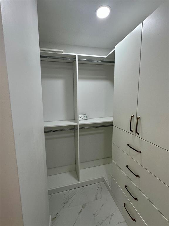 303 North Riverside Drive, Unit 1002 Pompano Beach, FL 33062 - Photo 22 of 27 a view of walk in closet