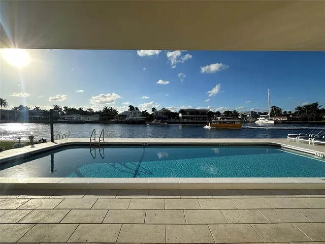 a view of swimming pool from a outdoor space