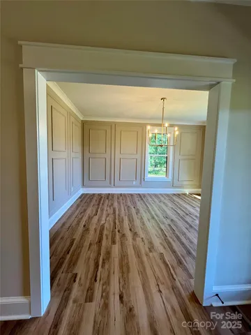 a view of livingroom with hardwood floor and window