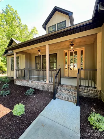 a front view of a house with a porch
