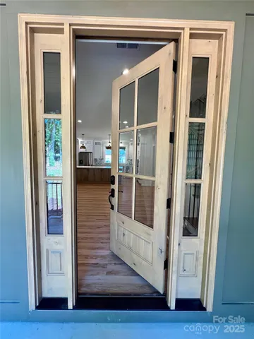 a view of a bedroom from the hallway